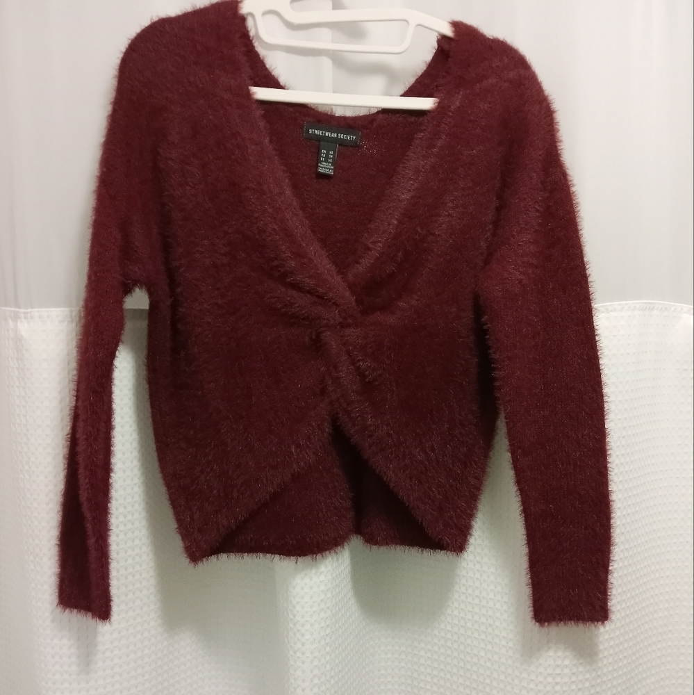 Worn once. Twist front sweater. EUC. Size xs. Merlot color.